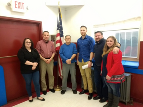 Veterans Advocacy Clinic Students (from left) Rachel Roush, Brad DeFlumeri, Alex Jonese, C.J. Reid, and Kirsten Lilly pose with United States Marine Corps Veteran Joe Gero (third from left), of Madison, during the students’ visit to VFW Post 5578.
